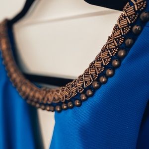 Dress with beaded collar and back.